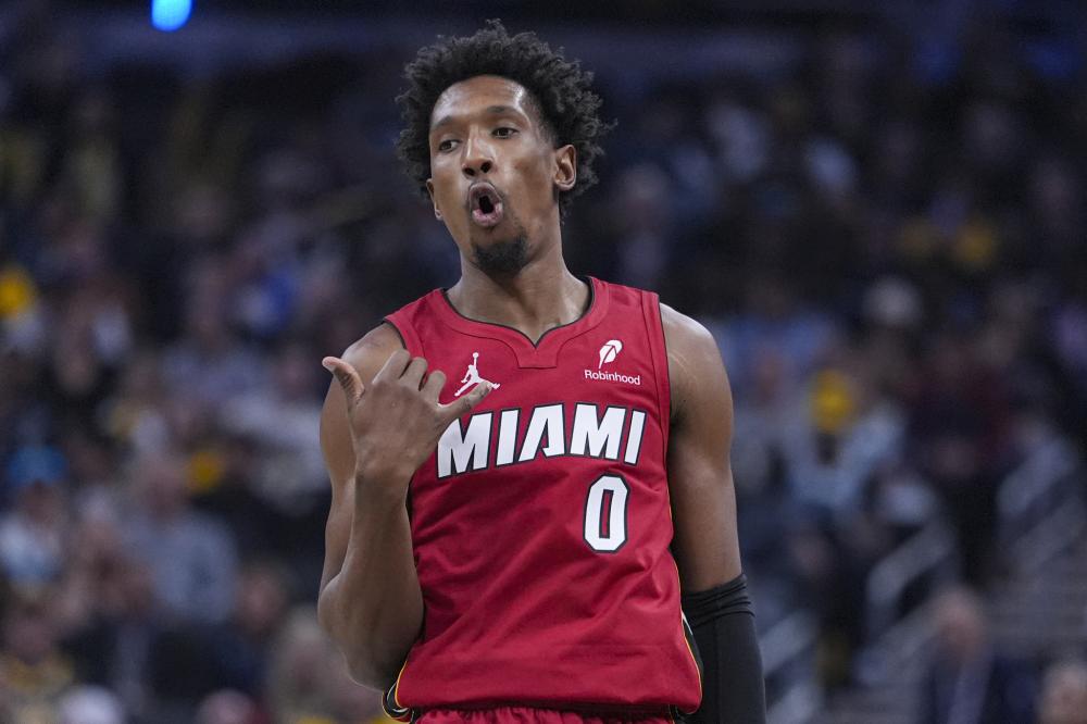 使得她在比 使得她在比